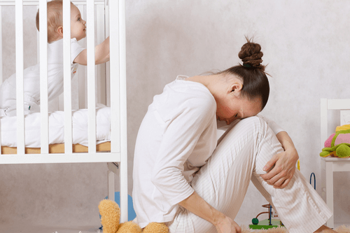 Postpartum depression young mother